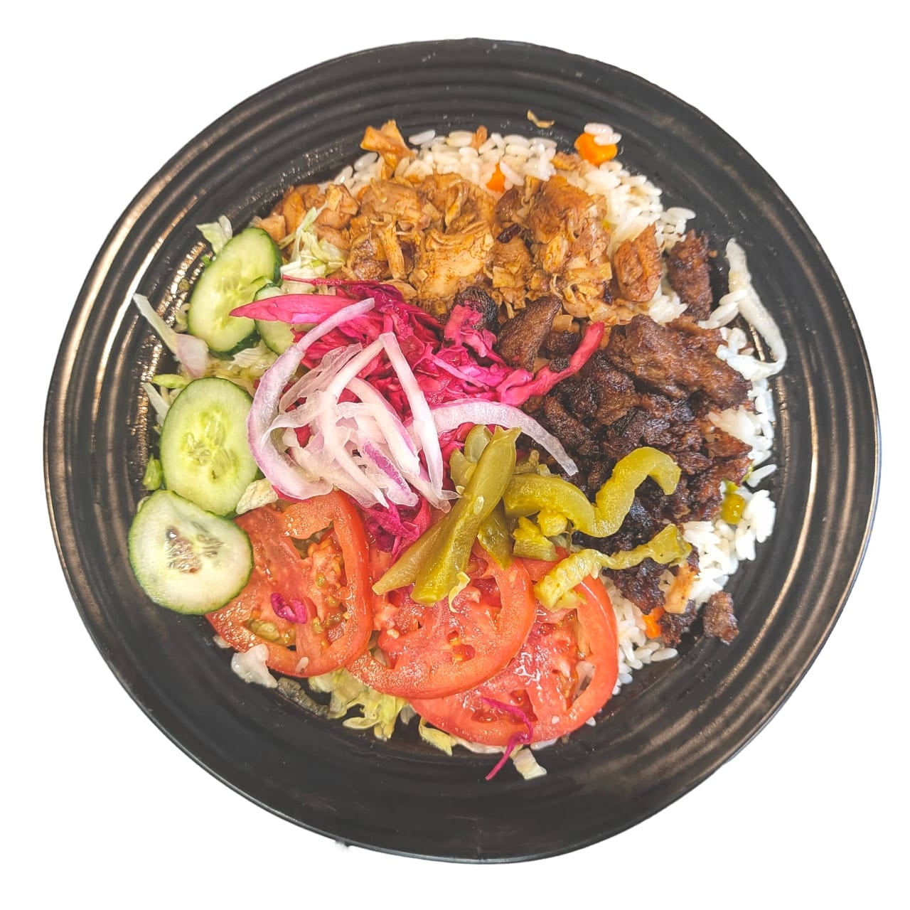 Mixed chicken and beef shawarma plate with rice, vegetables, pickles, and turnips